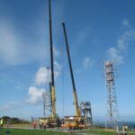 A photo of a lattice tower being erected at the Ministry of Defence in Aberporth